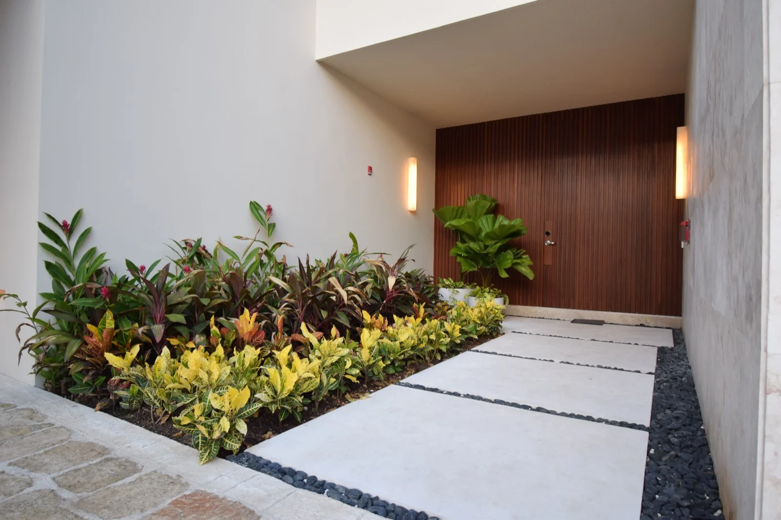 Villas de Rosewood – Acceso con jardín